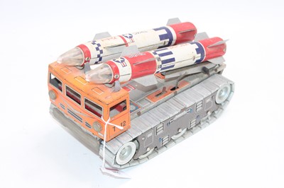 Lot 856 - Daiya Japan tinplate battery operated missile...