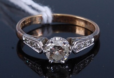Lot 318 - A yellow and white metal diamond single stone...