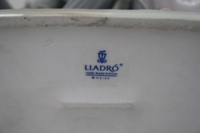Lot 4 - A Lladro porcelain figure group of a couple...