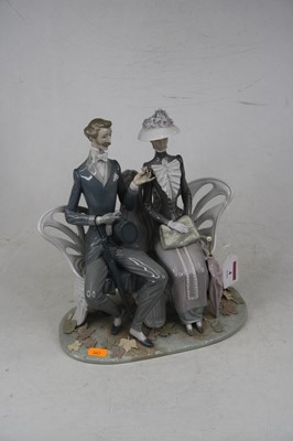 Lot 4 - A Lladro porcelain figure group of a couple...