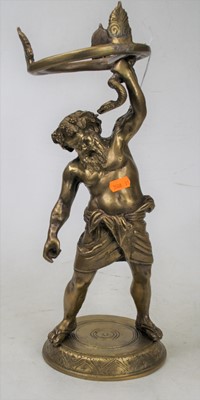 Lot 16 - A 20th century brass figure of Neptune holding...
