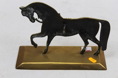 Lot 41 - An early 20th century bronze doorstop in the...