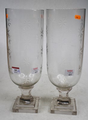 Lot 55 - A pair of contemporary glass hurricane lamps,...