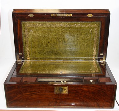 Lot 58 - A Victorian walnut and brass inlaid writing...