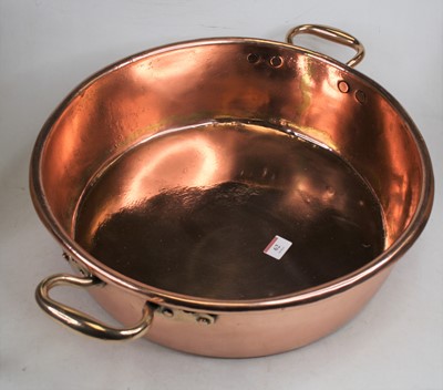 Lot 62 - A Victorian copper preserve pan, having twin...
