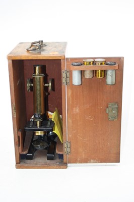 Lot 66 - An early 20th century brass monocular...