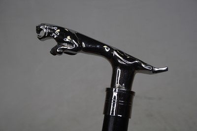 Lot 101 - A modern walking stick having an ebonised...