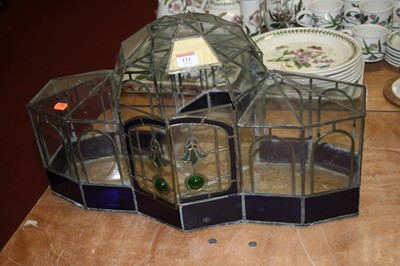 Lot 111 - A stained and leaded glass terrarium, h.33cm