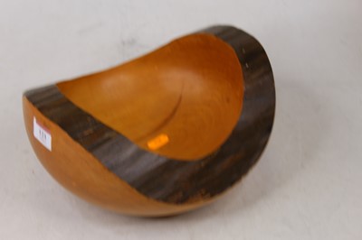 Lot 121 - A turned wooden bowl, incised verso T.D.L....