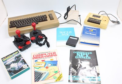 Lot 860 - A Commodore C64 Micro Computer comprising,...