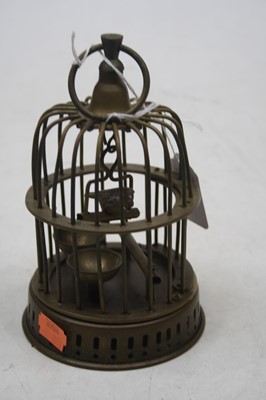 Lot 180 - A miniature gilt metal wirework birdcage,...