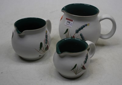 Lot 198 - A graduated set of three Denby Green Wheat...