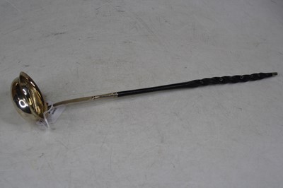 Lot 249 - A George III silver toddy ladle, having a...