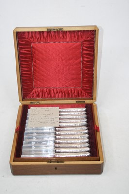 Lot 234 - A cased 12-place setting of silver bladed...
