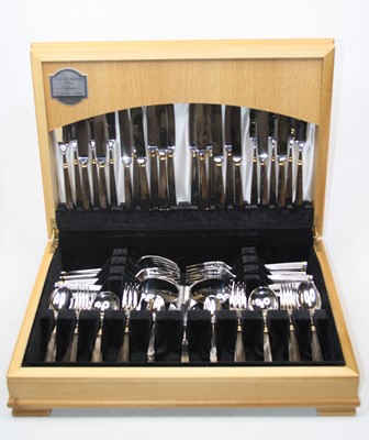 Lot 235 - A Guy Degrenne of France 12-place setting...