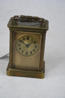 Lot 255 - An early 20th century lacquered brass cased...