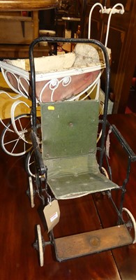 Lot 1288 - A painted wrought metal dolls pram; together...