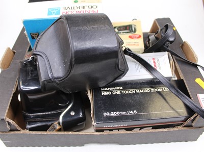 Lot 434 - A collection of cameras and accessories, to...