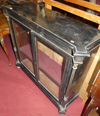 Lot 1369 - An Aesthetic Movement ebonised and gilt metal...