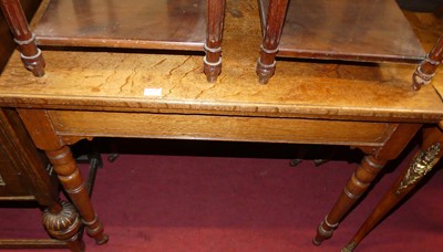 Lot 1373 - A later Victorian oak fold-over card table,...