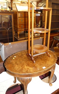 Lot 1383 - A figured walnut piecrust topped oval low...