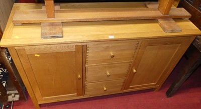 Lot 1388 - A contemporary light oak sideboard, having...