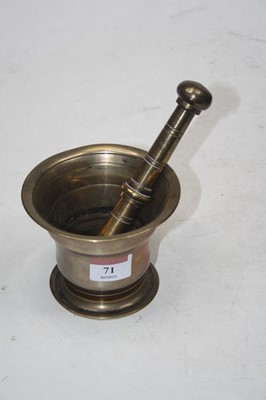 Lot 71 - A Victorian brass pestle & mortar