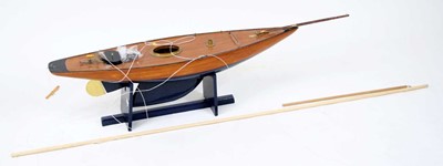 Lot 99 - A wooden kit built model of a sailing boat,...