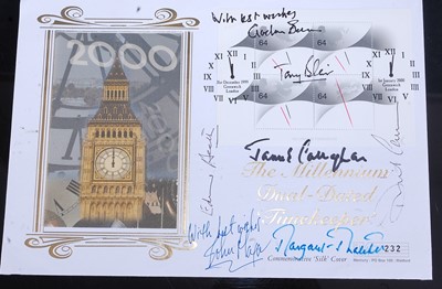 Lot 1215 - A collection of signed items bearing the...