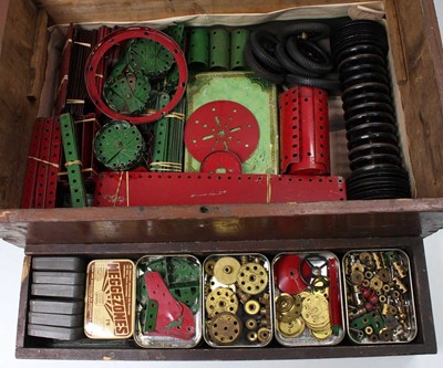 Lot 111 - A large wooden crate containing red & green...