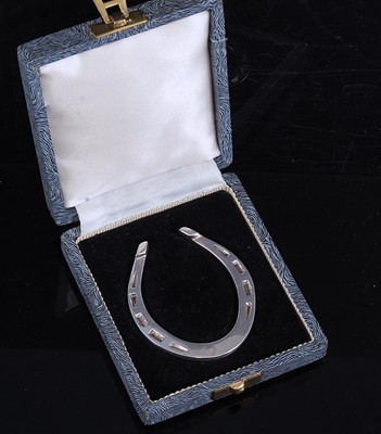 Lot 313 - An Elizabeth II silver novelty napkin ring in...