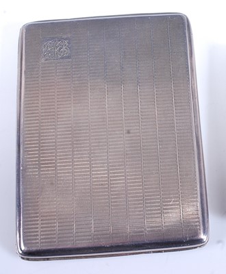 Lot 212 - An Art Deco silver engine turned pocket...