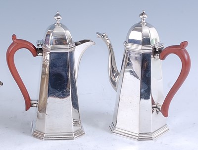 Lot 217 - An Art Deco silver coffee pot and matching hot...