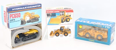 Lot 1311 - Construction group of 3 boxed models to...