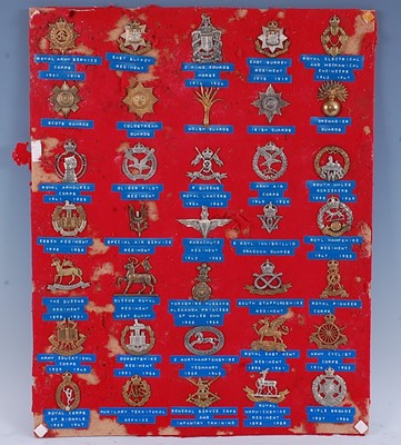 Lot 40 - A collection of assorted cap badges to include...