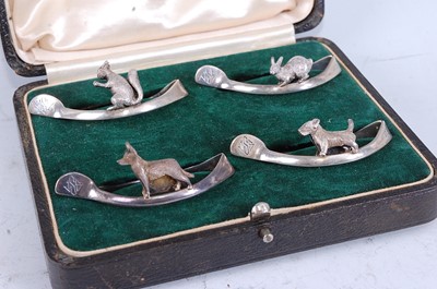 Lot 2144 - A cased set of four Mappin & Webb silver menu...