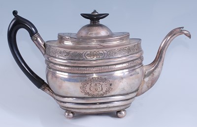 Lot 2106 - A late Georgian silver teapot, of ribbed oval...