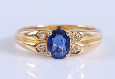 Lot 2168 - A yellow metal, sapphire and diamond five...