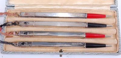 Lot 225 - A set of four 1930s sterling silver propelling...