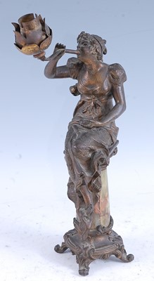 Lot 342 - A French Art Nouveau spelter and onyx table...