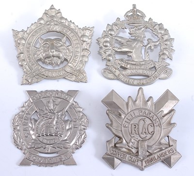 Lot 133 - A collection of assorted cap and glengarry...