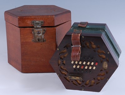 Lot 1007 - A Victorian fret carved rosewood concertina...