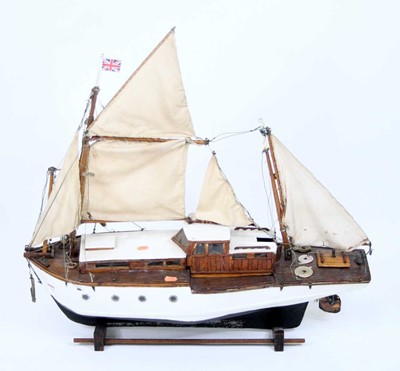 Lot 134 - A scratch-built wooden model of a twin mast...