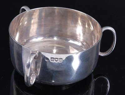 Lot 2134 - An Edwardian silver tyg. of plain form with...