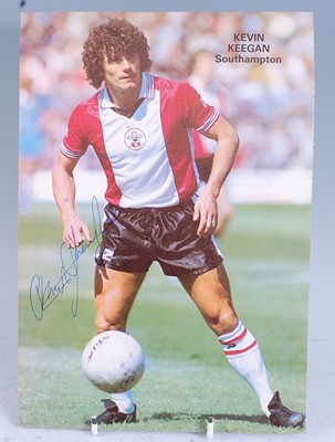 Lot 1272 - A collection of sport related photographs and...
