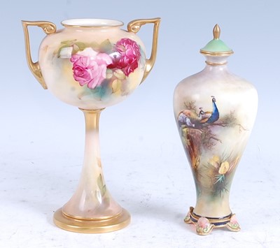 Lot 2078 - A 1911 Royal Worcester porcelain twin handled...