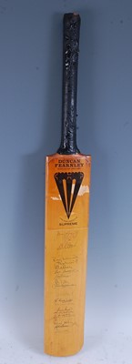 Lot 1277 - A Duncan Fearnley Supreme cricket bat, signed...