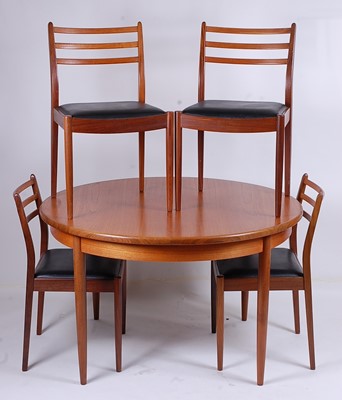 Lot 562 - A 1960s G-Plan teak dining suite, comprising;...