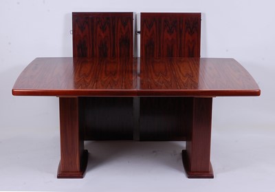Lot 497 - A 1960s palissandre extending dining table,...