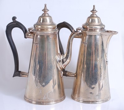 Lot 2148 - A George V silver hot water and coffee pot duo,...